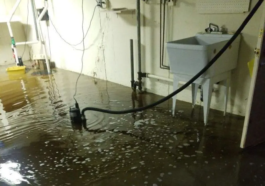 A failed sump pump and flooded pit in a Riverton, NJ basement